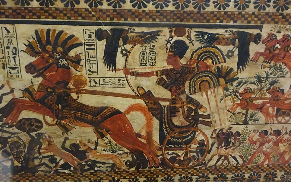 1024px-King_Tut_charging_enemies,_18th_dynasty