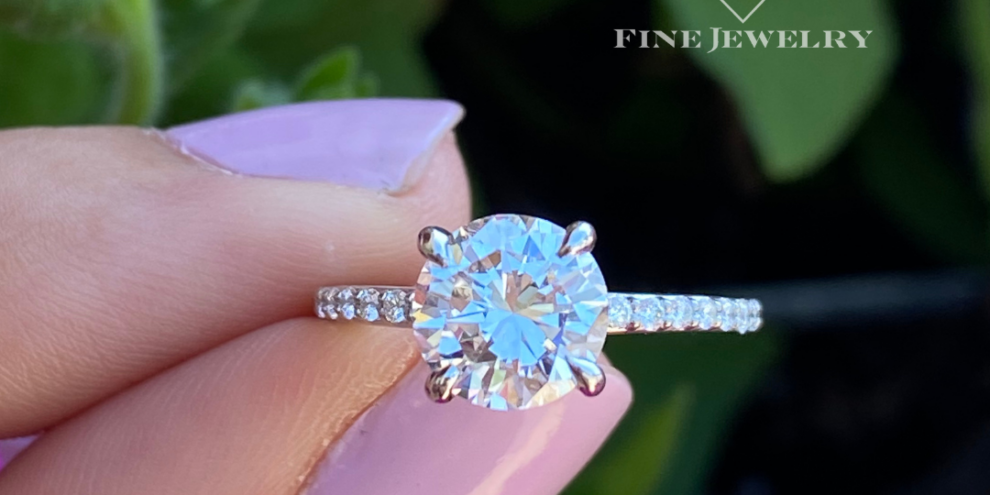 7 dainty accented band round diamond engagement ring, delicate accent band round diamond ring, round brilliant engagement ring with dainty band, thin band round diamond engagement ring, petite band round diamond ring, round diamond engagement ring with accent diamonds, dainty pavé band round diamond ring, minimal accent band round diamond ring, slender band round diamond engagement ring, delicate round diamond ring with side accents