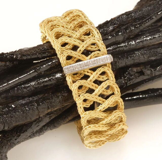 A delicately woven yellow gold cuff with a center panel of round brilliant diamonds - A very elegant piece for a very sophisticated person 💛 Handmade @secretefinejewelry 

 #SecreteFineJewelry  #FineJewelry #DCjewelry #MarylandJewelry #CustomJewelry #DMVjewelry #jewelrygram #instajewelry #jewelryaddict #jewelrydesign