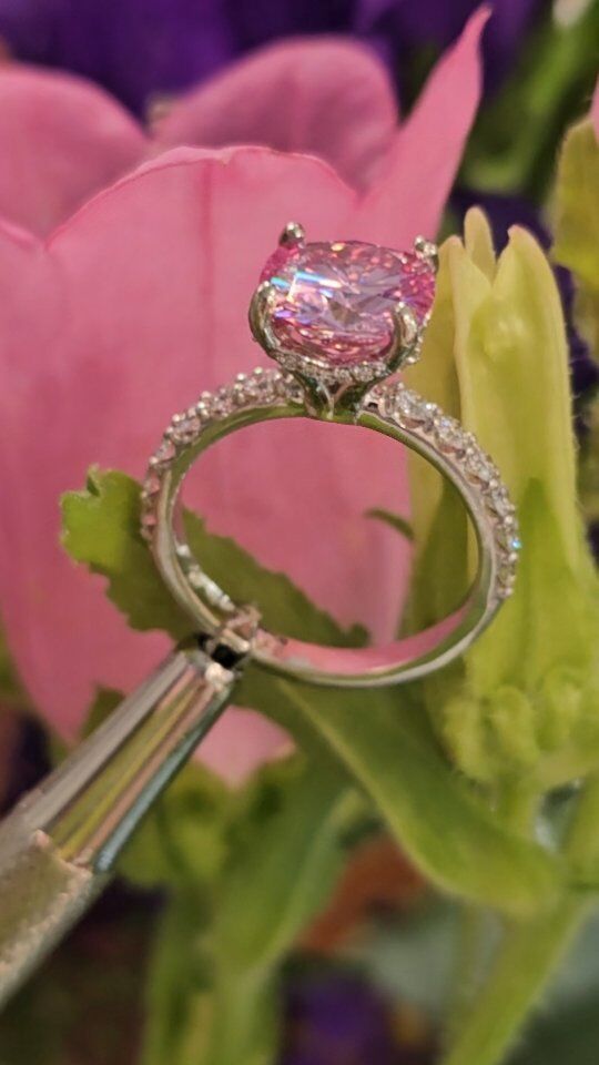 Can you guess what this gorgeous pink gemstone is?
🩷
🩷
🩷
🩷
🩷 
It's a Moissanite! 
Moissanites are a beautiful option for someone who wants a lot of refractive light and sparkle in their stone, and also for anyone who is on a budget, but wants something strong and durable. These gemstones have a hardness scale of 9.3 which is incredibly close to that of a Diamond! 

◇Ring available in our DC Showroom 

#smallbusiness #secretefinejewelry #design #moissanite #moissaniteengagementring #pinkmoissanite #engaged #dcbrides #dcluxury #dcwedding #dcproposal #customjewelry #dcweddings #bespokedcjewelry #engagement #design #customdesign #handcrafted #secretefinejewelry #diamondengagementring