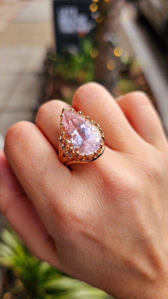 This STUNNING Kunzite pear is over 12 carats and has just graced us with her presence in our DC Showroom! 

Some people say that Kunzite, while being worn, stimulates your heart and gives you the potential to feel selfless love for who you are, and for those around you 💕

Check out all our new arrivals here and in Bethesda 🩷

#kunzitering #pear #statementjewels #statementring #18kgold #selflove #customjewelry #secretejewelry #dupontcircle #newarrival #dcluxury